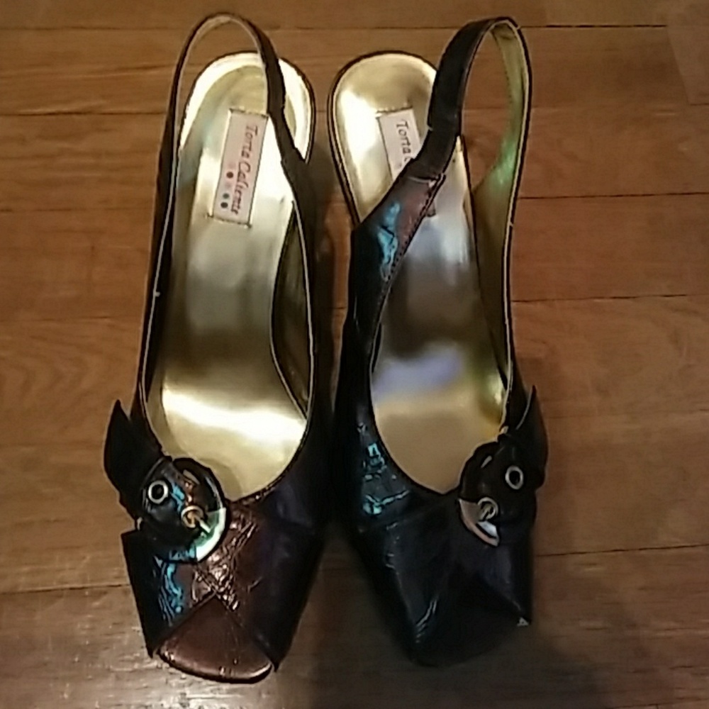 Torta Caliente heels. Metalic Brown. Lightly used.
